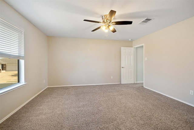 100 Snowy Egret Ln, Leander, TX 78641 - spare room featuring carpet floors, a ceiling fan, and baseboards