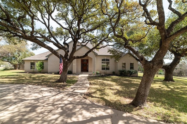 view of front of property with a front lawn