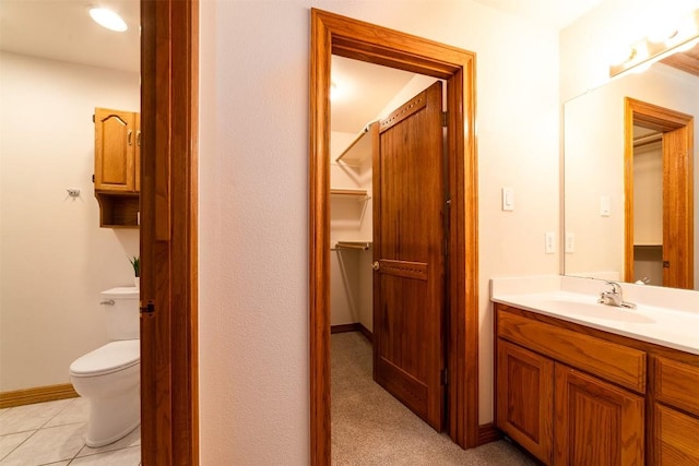 212 Cassidy Dr S, Georgetown, TX 78628 - bathroom featuring vanity, toilet, baseboards, and tile patterned floors