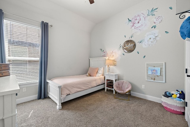 bedroom with multiple windows, baseboards, and light carpet