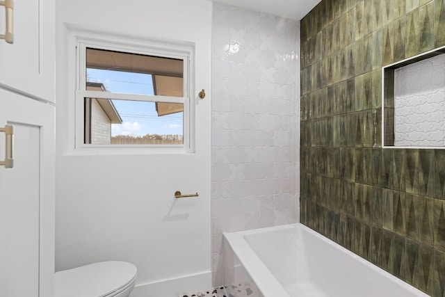 bathroom with shower / bath combination and toilet