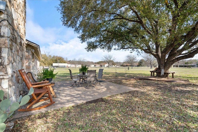 view of yard with a patio and fence