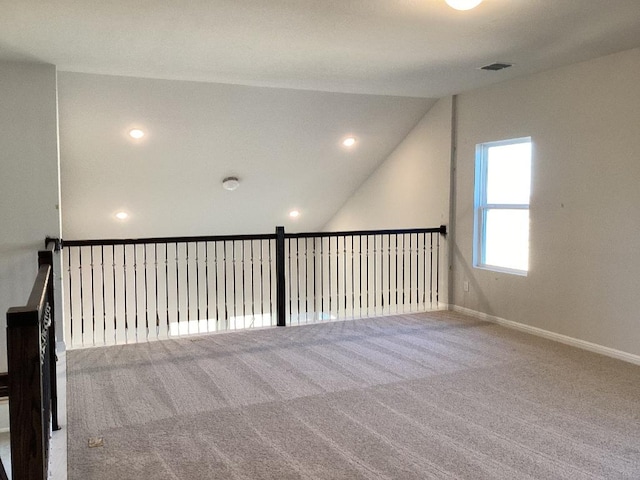 unfurnished room with visible vents, recessed lighting, baseboards, and carpet floors