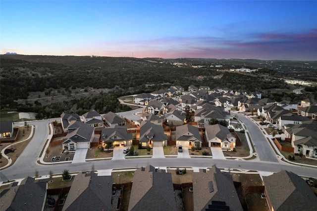 aerial view at dusk with a residential view