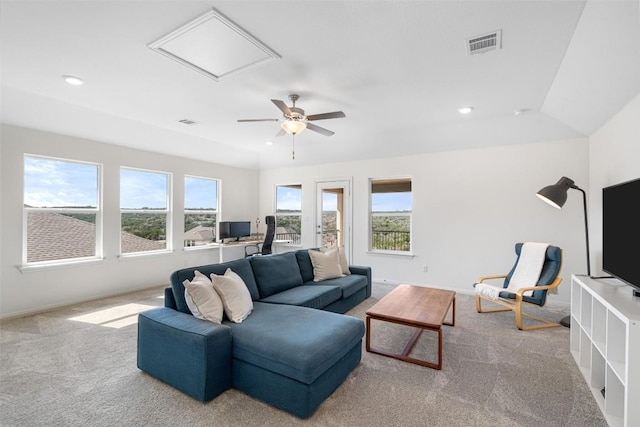 carpeted living area with recessed lighting, visible vents, baseboards, and ceiling fan