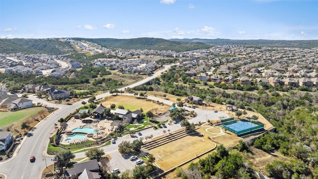 birds eye view of property with a residential view