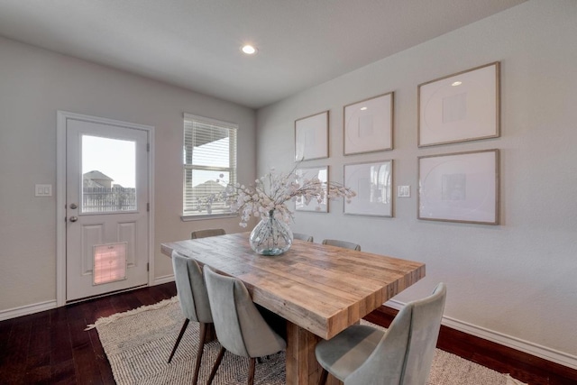 dining room with recessed lighting, baseboards, and dark wood-style floors