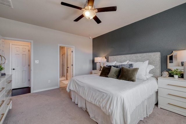 6717 Catania Loop, Round Rock, TX 78665 - bedroom featuring light carpet, connected bathroom, and a ceiling fan