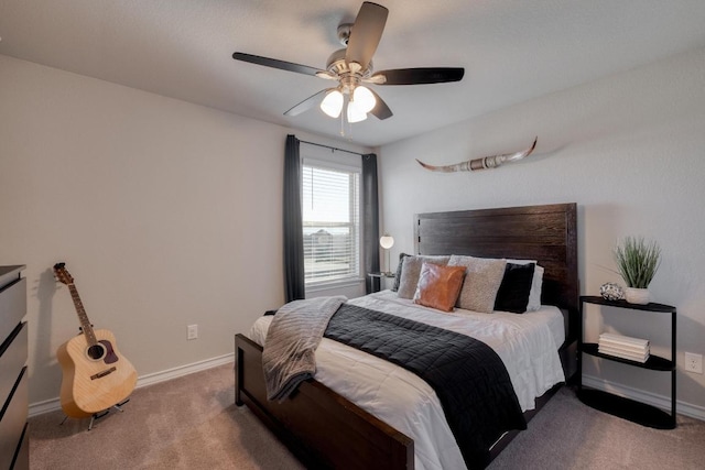 bedroom featuring carpet flooring, a ceiling fan, and baseboards