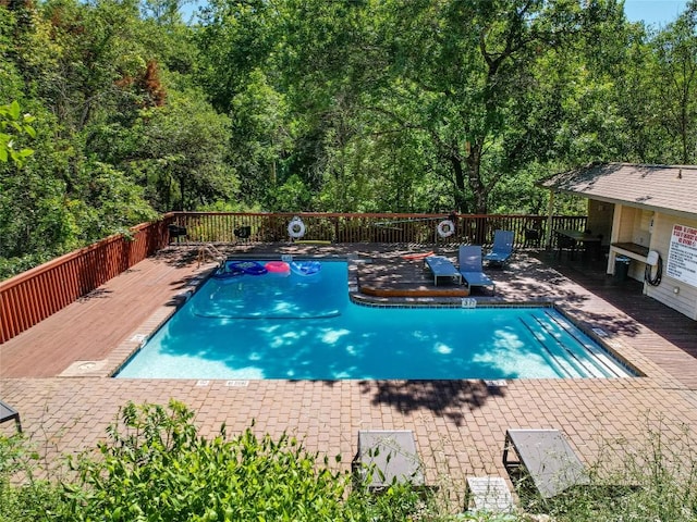 view of pool featuring a deck