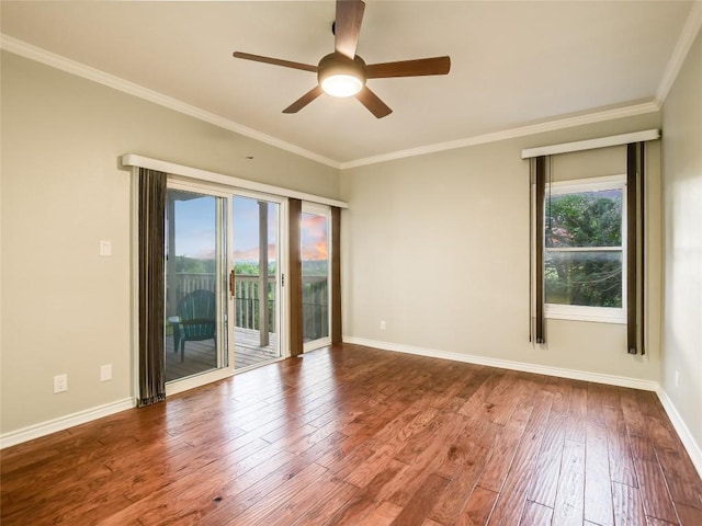 empty room featuring baseboards, ceiling fan, and hardwood / wood-style flooring