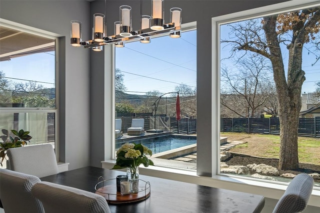 dining space featuring an inviting chandelier