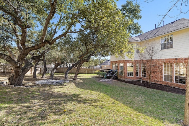 view of yard with fence