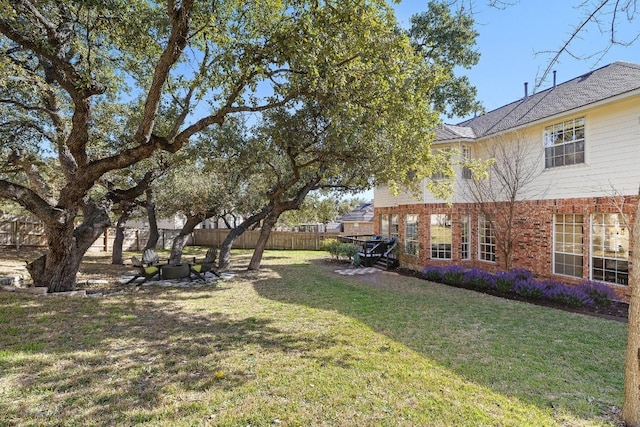 view of yard with fence