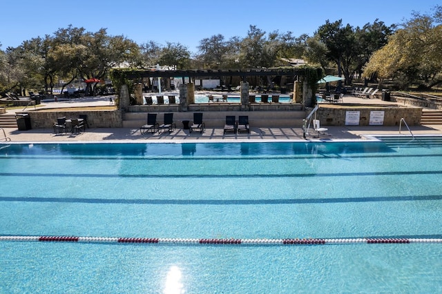 community pool with a patio