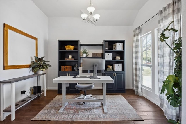 office area featuring an inviting chandelier, dark wood-style floors, baseboards, and vaulted ceiling