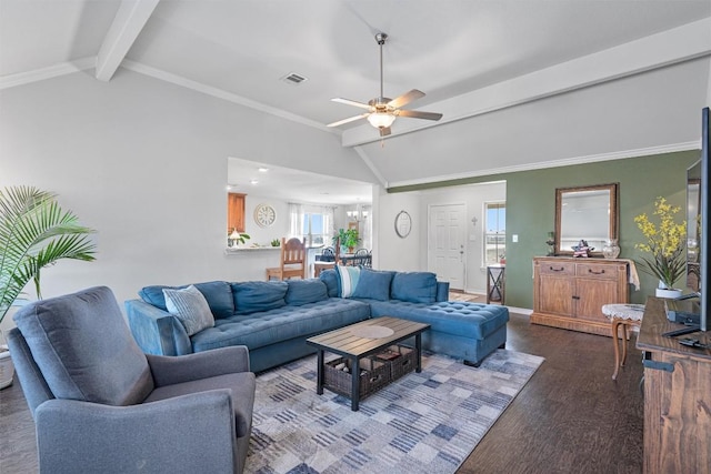 living area with wood finished floors, a ceiling fan, visible vents, baseboards, and vaulted ceiling with beams