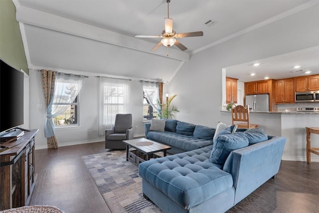 living area with visible vents, ceiling fan, baseboards, lofted ceiling with beams, and dark wood-style flooring