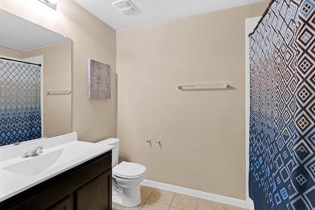 full bath with vanity, baseboards, visible vents, tile patterned floors, and toilet