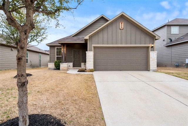 view of front of home with concrete driveway, a garage, and board and batten siding