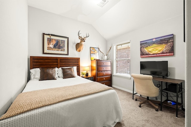 carpeted bedroom with visible vents, baseboards, and vaulted ceiling