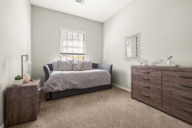 bedroom featuring carpet flooring, baseboards, and visible vents