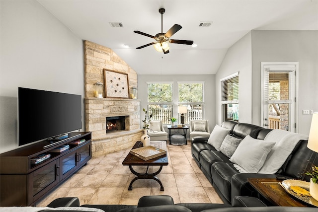 living area featuring vaulted ceiling, a ceiling fan, and visible vents