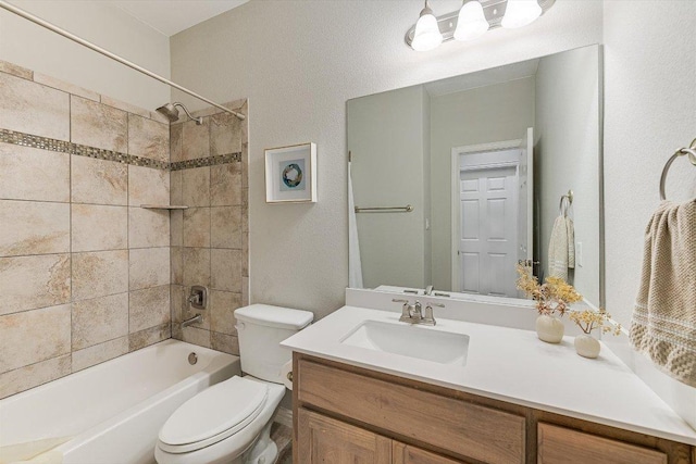 bathroom featuring vanity, toilet, and  shower combination