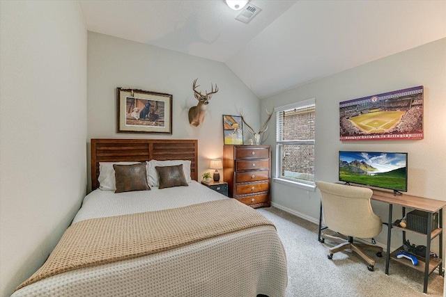 bedroom featuring lofted ceiling, carpet flooring, visible vents, and baseboards