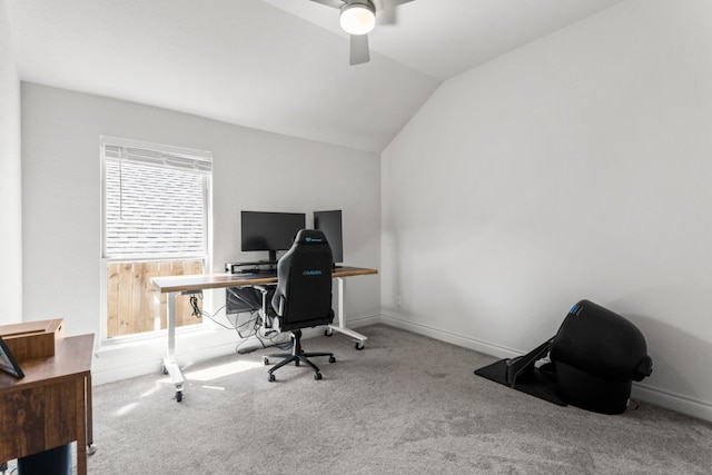 carpeted home office with baseboards, a ceiling fan, and lofted ceiling