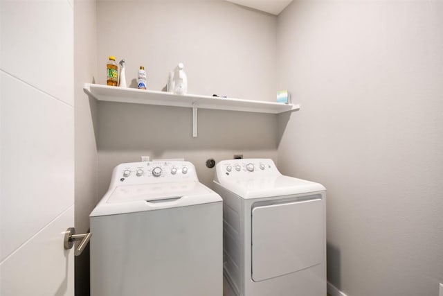 washroom with laundry area and washing machine and clothes dryer