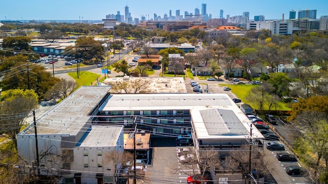 birds eye view of property featuring a view of city