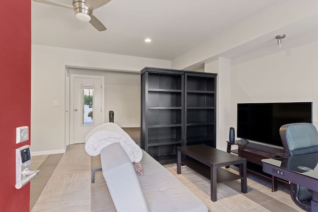 living room featuring recessed lighting, baseboards, a ceiling fan, and tile patterned floors