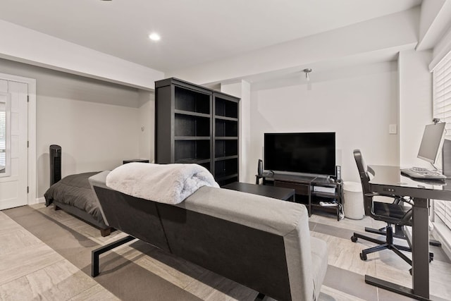 bedroom featuring multiple windows and recessed lighting