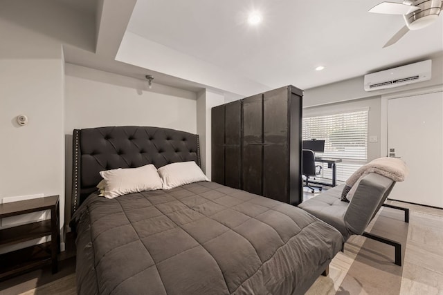 bedroom with recessed lighting and an AC wall unit