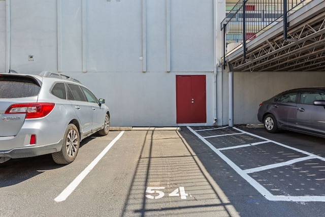 garage featuring uncovered parking