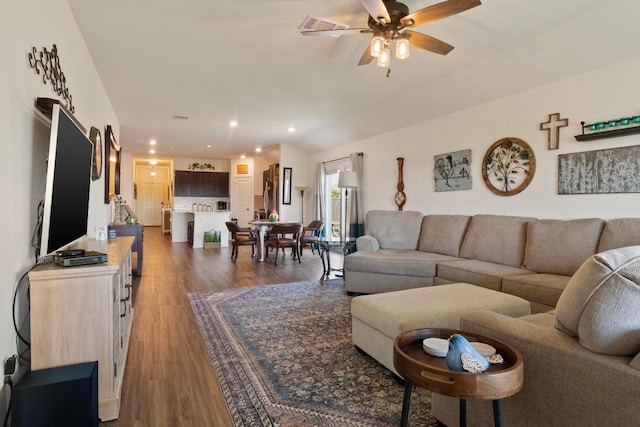 living area featuring recessed lighting, wood finished floors, and ceiling fan