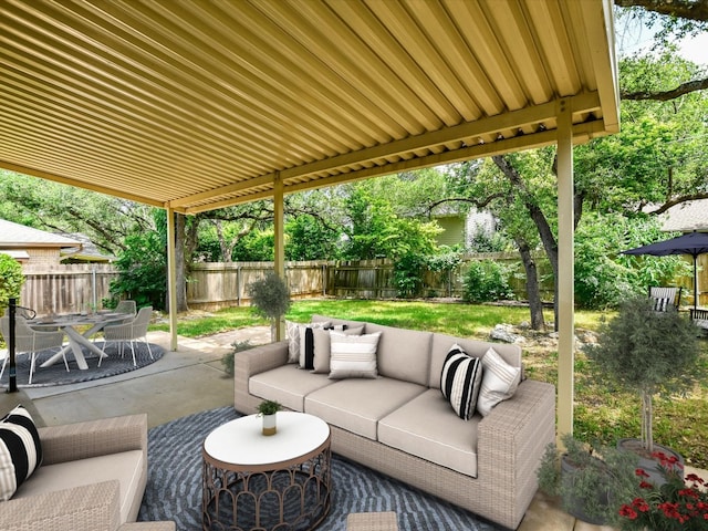 view of patio / terrace featuring an outdoor living space, outdoor dining area, and a fenced backyard