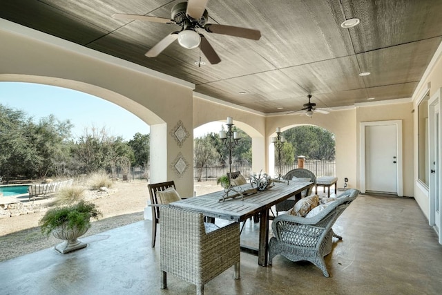 view of patio / terrace with outdoor dining space, a ceiling fan, and fence