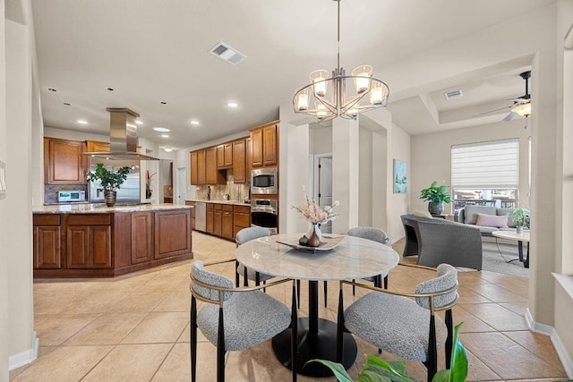 dining space with light tile patterned floors, recessed lighting, and visible vents