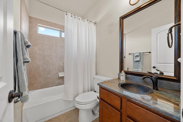 bathroom with vanity, toilet, and shower / bath combo