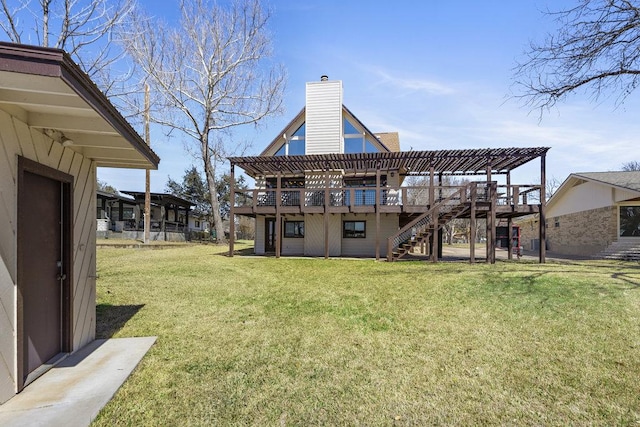 view of yard featuring stairs and a deck