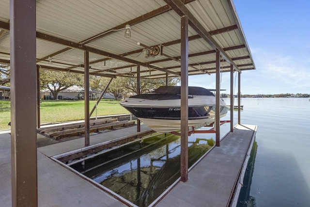 view of dock featuring a water view and boat lift