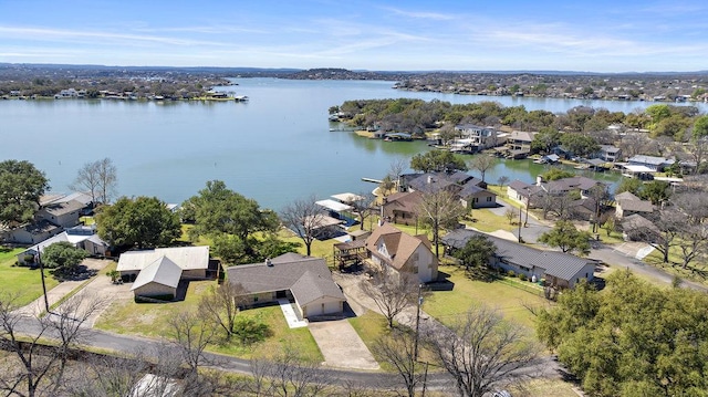 bird's eye view with a residential view and a water view