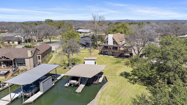 aerial view with a residential view and a water view