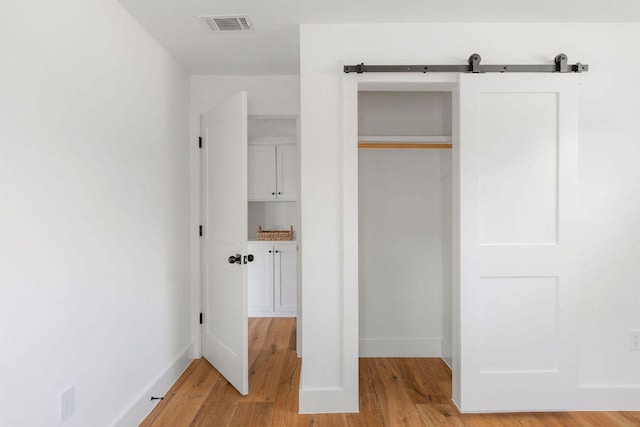 closet featuring visible vents