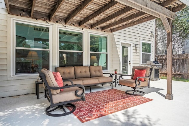 view of patio with an outdoor living space, area for grilling, and fence