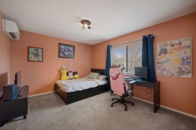 carpeted bedroom with a textured ceiling, baseboards, and a wall mounted AC