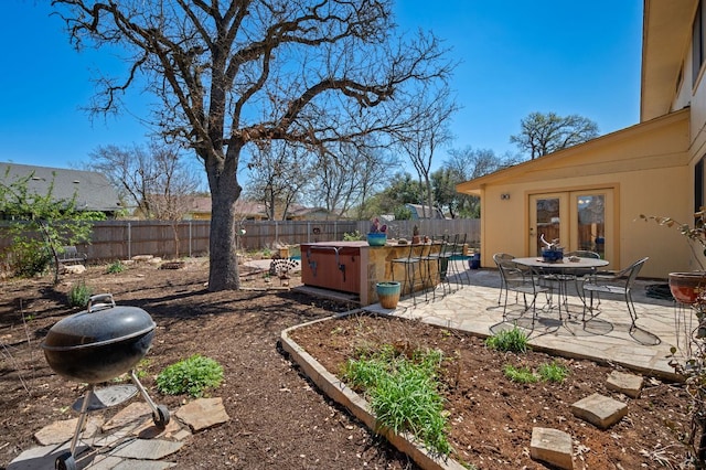 view of yard with a fenced backyard and a patio area