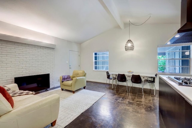 living area with a wealth of natural light, baseboards, finished concrete floors, and vaulted ceiling with beams